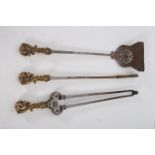 A GOOD SET OF THREE 19TH CENTURY POLISHED STEEL AND BRASS FIRE IRONS comprising poker shovel and