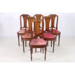 A SET OF SIX CONTINENTAL MAHOGANY SATINWOOD INLAID AND GILT BRASS MOUNTED DINING CHAIRS each with a