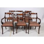 A SET OF EIGHT REGENCY DESIGN MAHOGANY DINING CHAIRS including a pair of elbow chairs each with a
