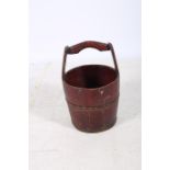 A DUTCH HARDWOOD AND STEEL BOUND BUCKET with carrying handle of cylindrical tapering form 54cm (h)