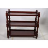 A 19TH CENTURY MAHOGANY THREE TIER DUMB WAITER of rectangular outline with moulded three quarter