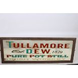 AN ADVERTISEMENT SIGN for Tullamore Dew inscribed Tullamore Dew established 1829 Pure Pot Stilled