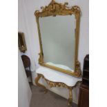 A 19TH CENTURY GILTWOOD CONSOLE TABLE AND MIRROR the rectangular plate within a moulded frame with