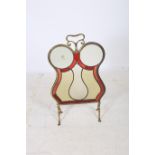 A 19TH CENTURY BRASS LEAD GLASS AND COLOURED GLASS FIRE SCREEN the shaped frame with carrying