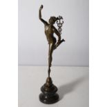 AFTER G BOLOGNA A BRONZE FIGURE modelled as Hermes the messenger of Gods shown standing on a