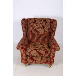 A WING CHAIR EN-SUITE TO PREVIOUS LOT