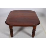 A 19TH CENTURY MAHOGANY COFFEE TABLE of rectangular outline with rounded corners on turned fluted