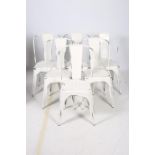 A SET OF SIX RETRO WHITE METAL PAINTED CHAIRS each with an arched top rail and panelled splat with
