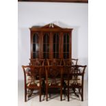 A TWELVE PIECE WALNUT AND MAHOGANY DINING ROOM SUITE comprising ten chairs including a pair of