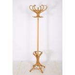 A BENTWOOD HAT COAT AND STICK STAND of typical form 194cm (h) THE BUYER OF THIS LOT WILL BE GIVEN