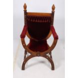 A 19TH CENTURY GOTHIC DESIGN MAHOGANY THRONE CHAIR the rectangular top rail above an upholstered