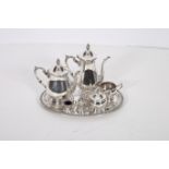 A FOUR PIECE SILVER PLATED TEA AND COFFEE SERVICE ON TRAY together with a three piece condiment set