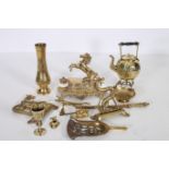 A COLLECTION OF BRASS WARE to include a desk stand embossed kettle vase etc etc