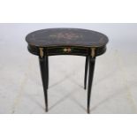 A CONTINENTAL EBONISED POLYCHROME AND GILT BRASS MOUNTED SIDE TABLE of kidney shaped outline the