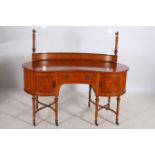 A 19TH CENTURY SATINWOOD THREE PIECE BEDROOM SUITE comprising kidney shaped dressing table the back