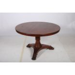 A GOOD IRISH REGENCY MAHOGANY POD TABLE CORK of circular outline with reeded rim above a spiral