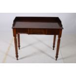 A 19TH CENTURY MAHOGANY SIDE TABLE of rectangular outline the shaped top with moulded three quarter