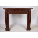 A FINE CARVED WOOD CHIMNEY PIECE the rectangular shelf with egg and dart decoration above a carved