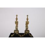 A GOOD PAIR OF 19TH CENTURY BRASS FIRE DOGS each with an urn finial raised on a platform base