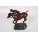 JUILET CURSHAM A BRONZE FIGURE modelled as a horse with polo player up on a green marbled base