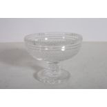 A WATERFORD CUT GLASS BOWL with turned column on a circular foot 14cm (h) x 8cm (d)