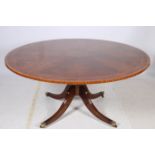 A FINE MAHOGANY BURR WALNUT SATINWOOD AND KINGWOOD CROSS BANDED POD TABLE the circular segmented