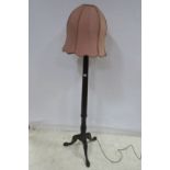 A 19TH CENTURY MAHOGANY FLOOR STANDARD LAMP with reeded carved column on tripod support with claw