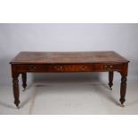 A FINE MAHOGANY PARTNERS LIBRARY TABLE of rectangular outline with tooled leather inset above three