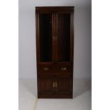 A CANADIAN HARDWOOD CHINA DISPLAY CABINET of rectangular outline with glazed doors the interior
