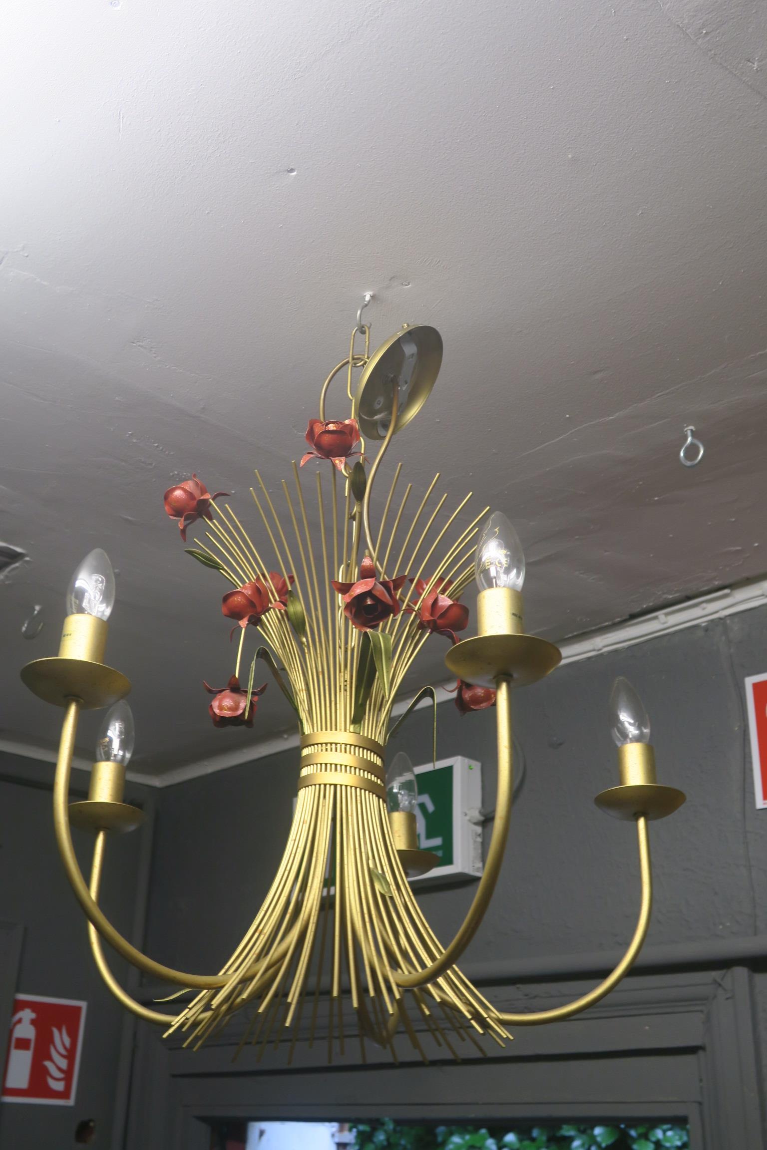 A CONTINENTAL GILT METAL FIVE BRANCH CENTRE LIGHT with flower head central column issuing five