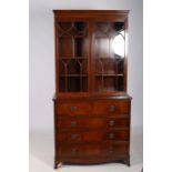 A GEORGIAN DESIGN MAHOGANY SECRETAIRE BOOKCASE the dentil moulded cornice above a pair of astragal