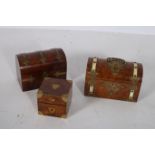 A 19TH CENTURY WALNUT AND BRASS BOUND TEA CADDY of rectangular dome outline together with a 19th