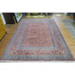 A HERATI WOOL RUG the light pink and light blue ground with central panel filled with flowerheads