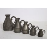 A SET OF FIVE 19TH CENTURY GRADUATED PEWTER MEASURES