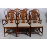 A FINE SET OF TWELVE HEPPLEWHITE DESIGN MAHOGANY DINING CHAIRS including a pair of elbow chairs
