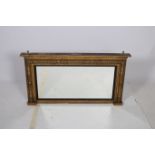 A 19TH CENTURY GILTWOOD AND GESSO OVERMANTLE MIRROR the rectangular plate within a knopped and