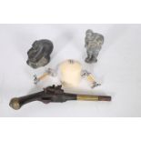 AN IVORY LIDDED BOX together with a pair of ivory and plated carving rests a flintlock pistol and