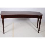 A 19TH CENTURY MAHOGANY SIDE TABLE the shaped top with reeded rim above a fluted frieze on spiral