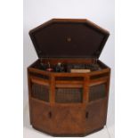 A RETRO WALNUT CASE GARRARD GRAMOPHONE of rectangular form with canted angles the base with