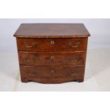 A GOOD CONTINENTAL WALNUT CROSS BANDED CHEST of demilune outline the shaped top with three long