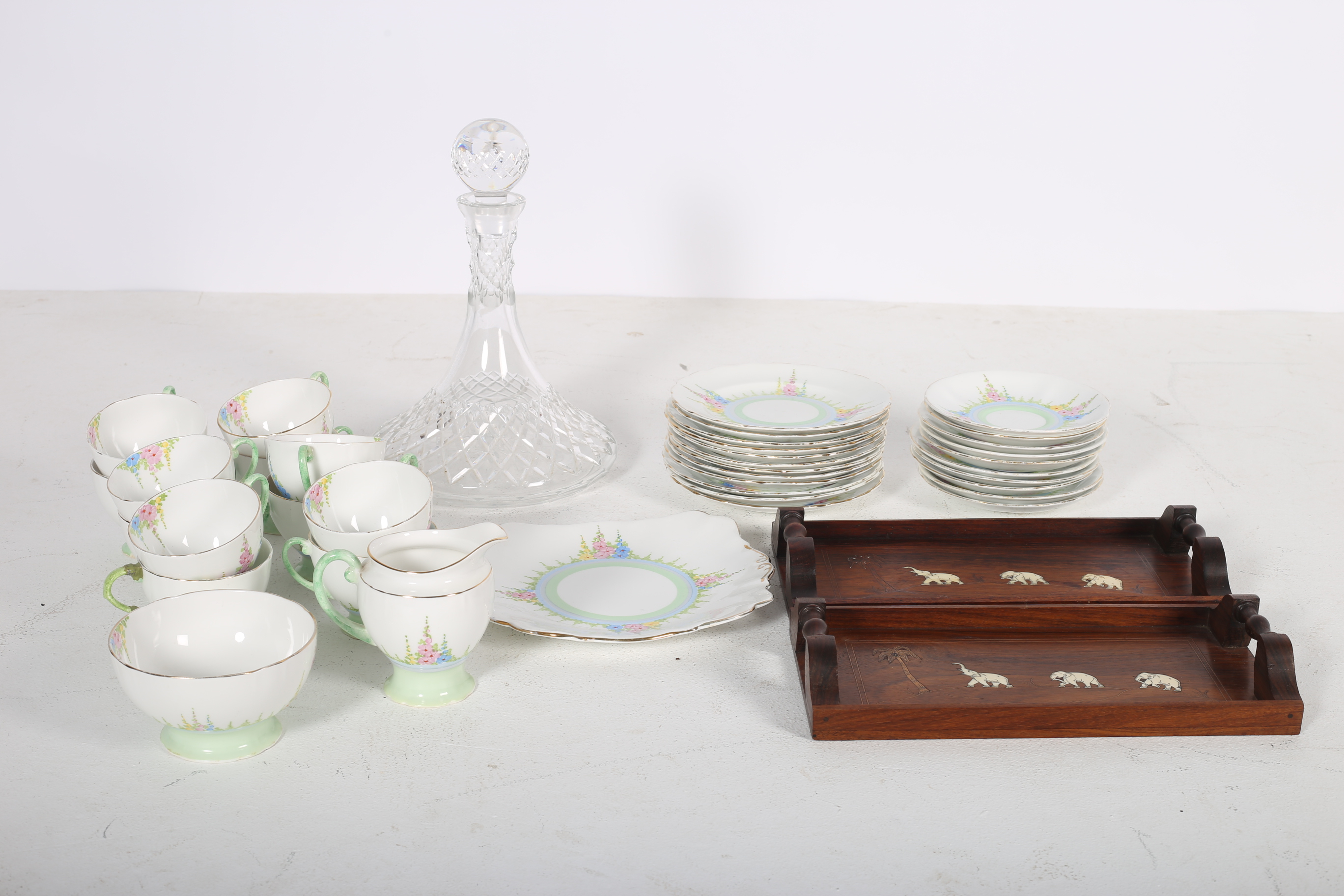 A THIRTY NINE PIECE ROYAL STANDARD BONE CHINA TEA SET the white ground with floral painted panels