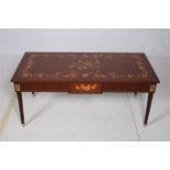 A CONTINENTAL KINGWOOD AND MARQUETRY COFFEE TABLE of rectangular outline the shaped top with