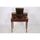 A FINE 19TH CENTURY MAHOGANY AND BRASS INLAID WRITING TABLE the superstructure with pierced brass