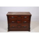 A 19TH CENTURY CONTINENTAL MAHOGANY CHEST of rectangular outline the shaped top with three long