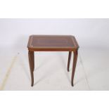 A CONTINENTAL MAHOGANY AND SATINWOOD INLAID OCCASIONAL TABLE of rectangular outline the shaped top