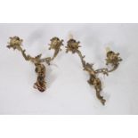 TWO 19TH CENTURY FRENCH BRASS TWO BRANCH WALL MOUNTED CANDLE SCONCES each in rococo style with