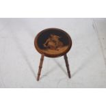 A 19TH CENTURY CONTINENTAL HARDWOOD OCCASIONAL TABLE the circular top inlaid with figures depicting