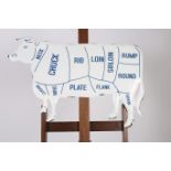 A WHITE ENAMEL WALL SIGN in the form of a cow depicting various cuts 51cm x 83cm