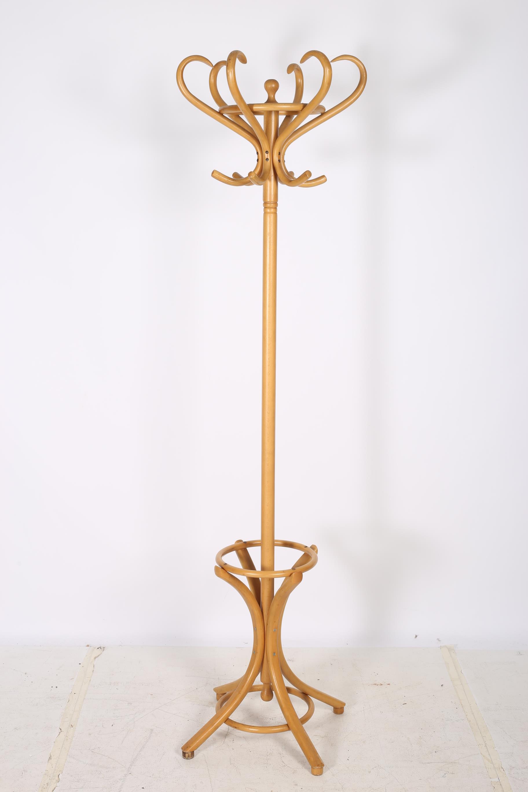 A BENTWOOD HAT COAT AND STICK STAND of typical form 194cm (h) THE BUYER OF THIS LOT WILL BE GIVEN