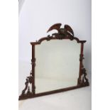 A 19TH CENTURY MAHOGANY OVERMANTLE MIRROR the rectangular arched plate within a moulded and carved
